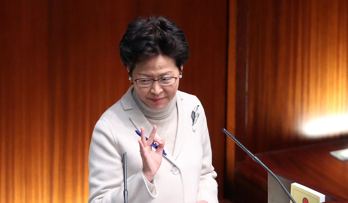 Hong Kong Chief Executive Carrie Lam attends a question-and-answer session at the Legislative Council on January 11. Lam has indicated that she stands by her pick for new justice secretary, despite the illegal structures found at her residence. Photo: K. Y. Cheng