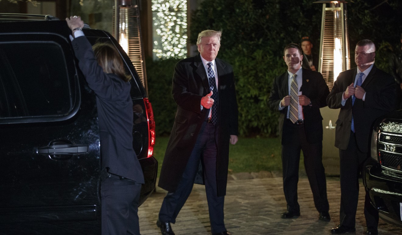 Then President-elect Donald Trump arrives for a party at the home of Robert Mercer in December 2016. File photo: AP