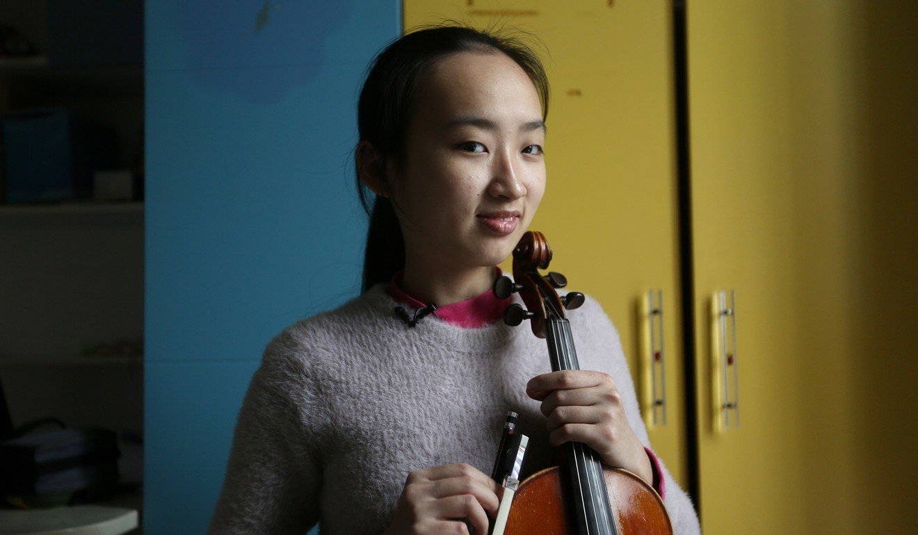 Yijie was born with poor vision, and her eyesight has deteriorated over the years. She learned to read music and started playing the violin aged six. Photo: Xiaomei Chen