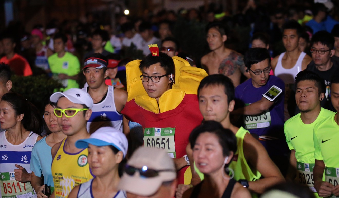 A man dressed as fast food fries during the marathon. Photo: Felix Wong