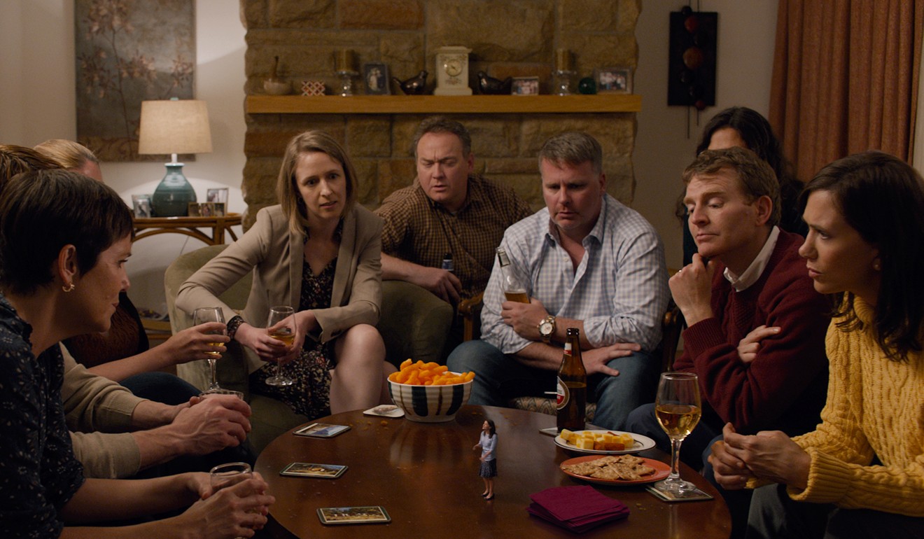 Kristen Wiig (far right) and Maribeth Monroe (centre) in a still from the film.