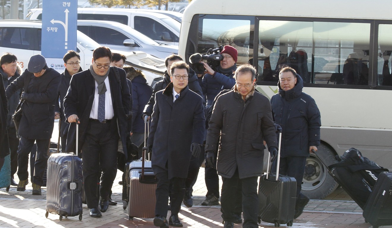 A South Korean delegation led by Lee Joo-tae, centre, director general for the inter-Korean exchange and cooperation in the Ministry of Unification South Korea, leave for North Korea to inspect the venues in the Mount Kumgang area and Masikryong Ski Resort, both in the east of North Korea. Photo: EPA
