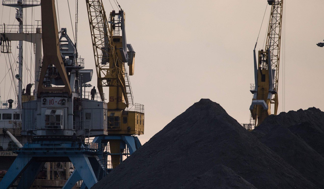 This photo taken on November 21, 2017 shows a general view of North Korean coal piled up on a dockside at the port in Rason. Russia has emerged as a key transshipment point for North Korea coal being exported to evade UN sanctions for its missile programme. Photo: AFP