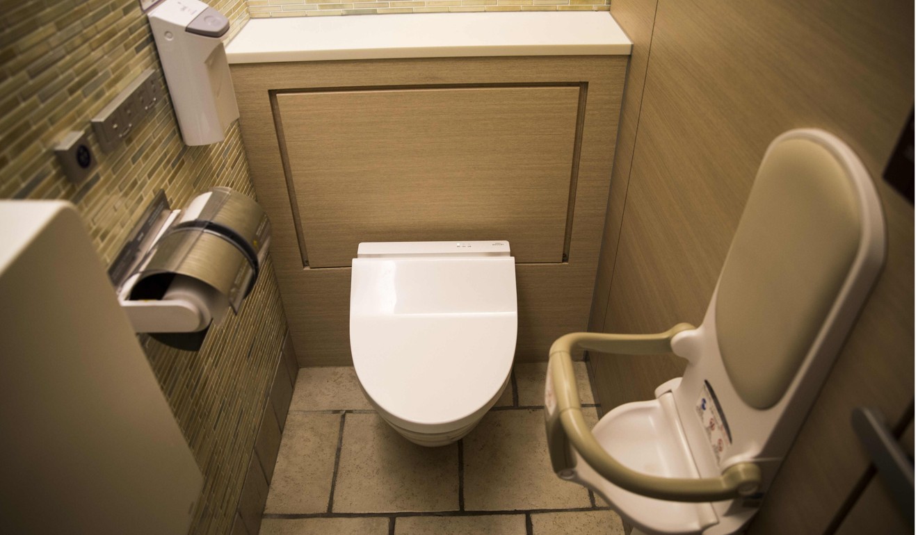 An infant seat next to a heated toilet in a shopping centre in Tokyo. File photo: AFP
