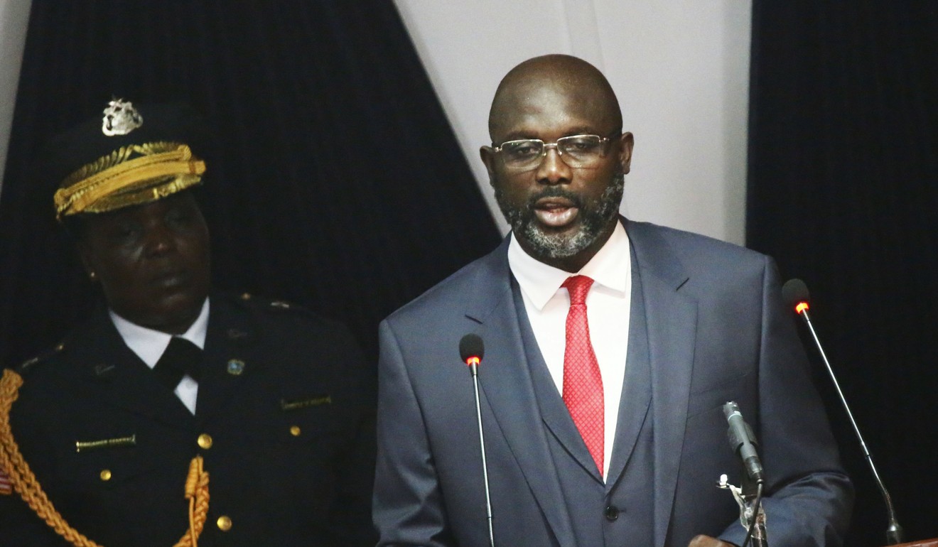 Liberian President George Weah speaks to legislators during his State of the Nation address at the joint chambers of the National Legislators in Monrovia on Monday. Photo: EPA