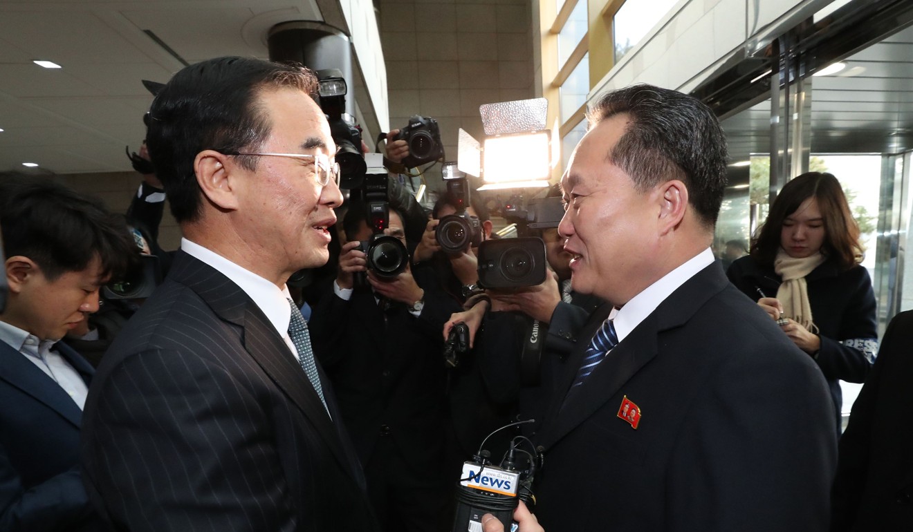 South Korea Unification Minister Cho Myung-Gyun (left) greets North Korean chief delegate Ri Son-Gwon before their meeting at the border truce village of Panmunjeom in the demilitarised zone last month. Photo: AFP