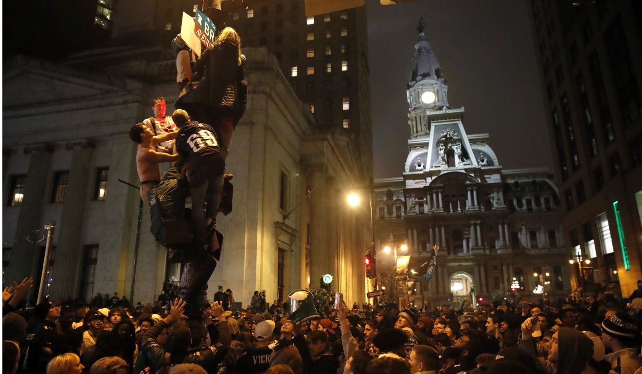 Philadelphia Eagles fans celebrate the team's victory. Photo: AP