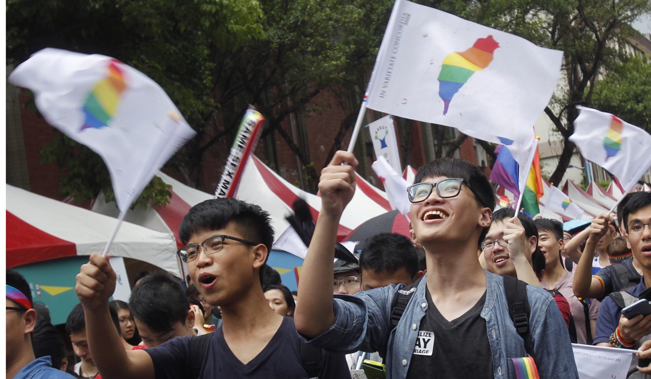 Supporters of same-sex marriage celebrate a Constitutional Court ruling, outside the Legislative Yuan in Taipei last May. Photo: AP