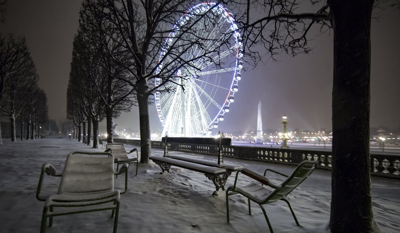 The Tuileries gardens, in Paris, blanketed in Snow. Photo: EPA