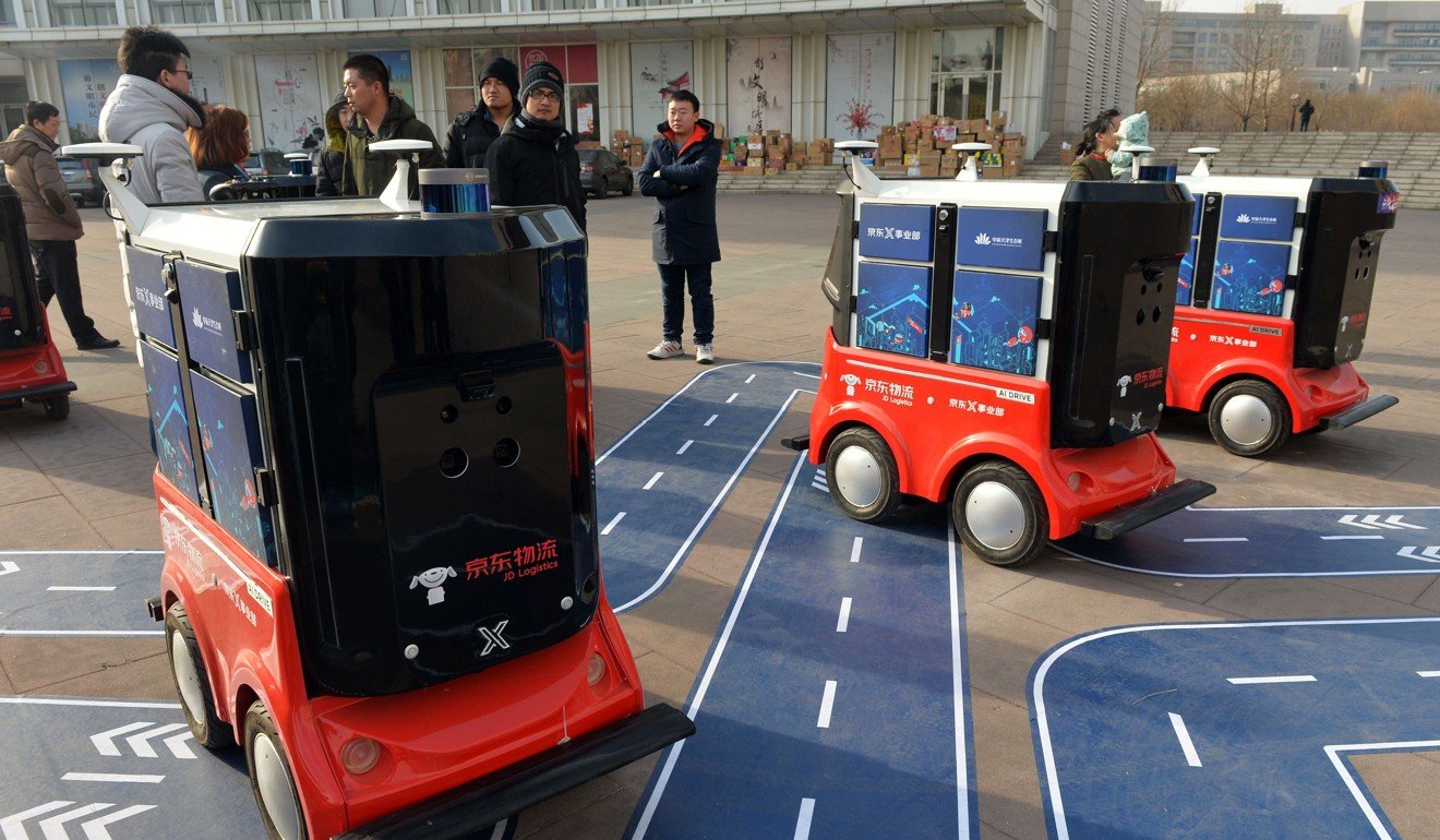 Driverless delivery vehicles for e-commerce firm JD.com are tested in Tianjin last month. China wants to become a global powerhouse in AI technology and its applications. Photo: AFP