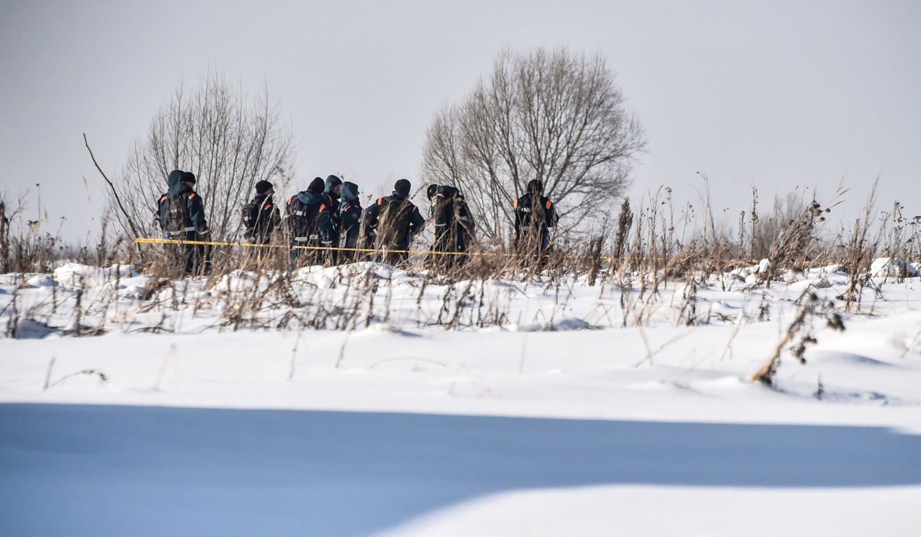 Rescuers at the site of the plane crash in Ramensky district. Photo: AFP