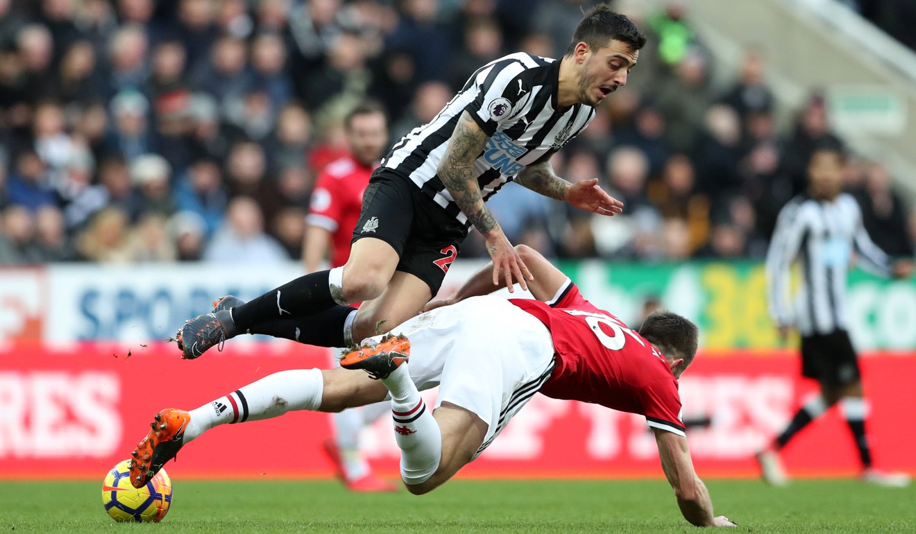 Newcastle United’s Joselu in action with Manchester United’s Michael Carrick. Photo: Reuters