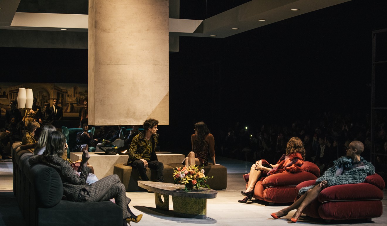 Models lounging on the show set.