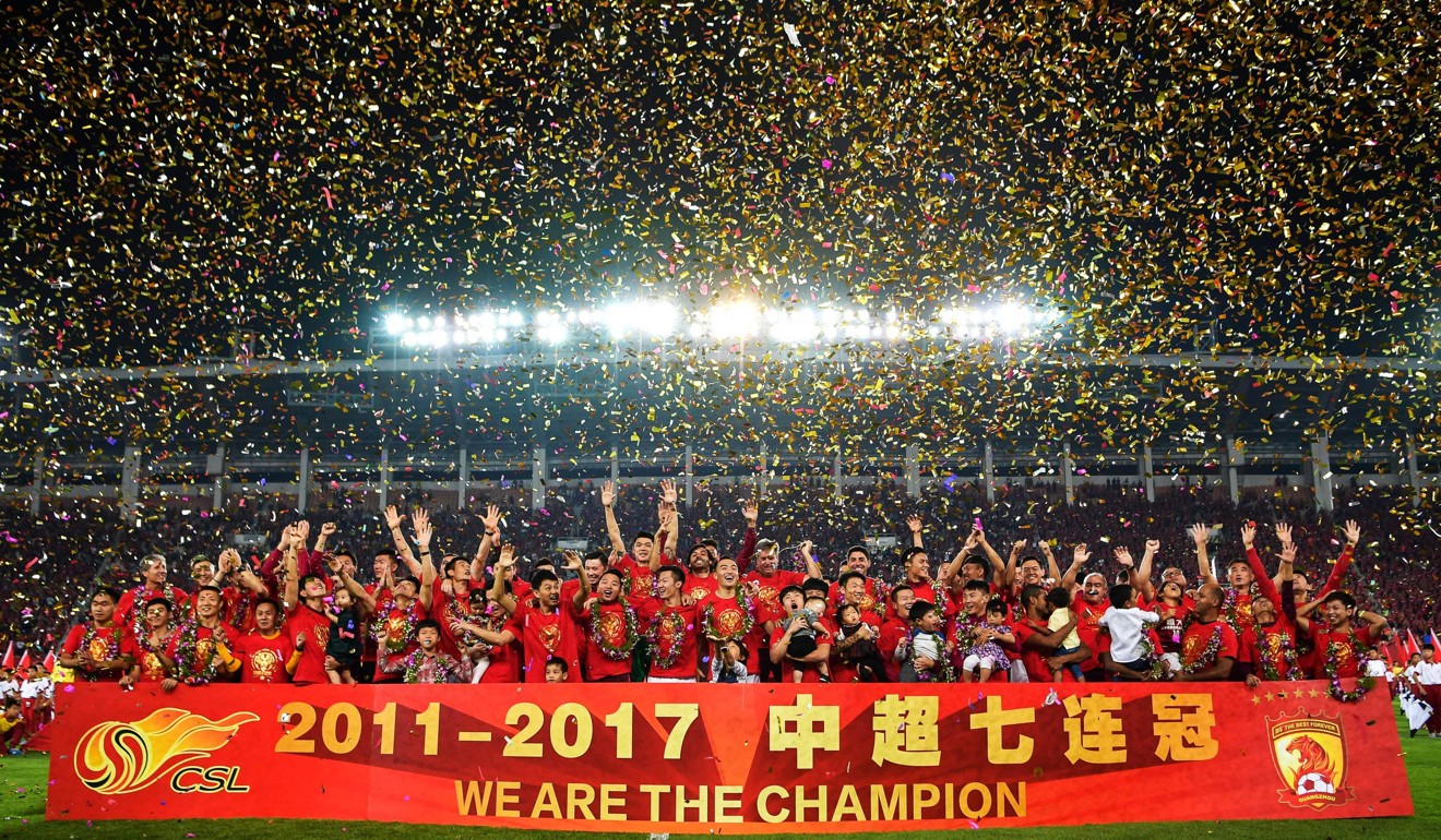 Guangzhou Evergrande celebrate after winning the Chinese Super League for the seventh time in a row. Photo: AFP