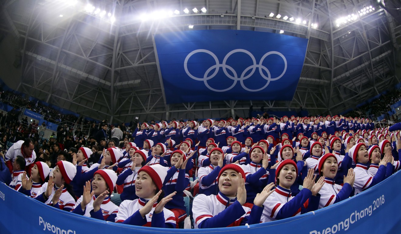 North Korea cheer at the men's ice hockey. Photo: AP