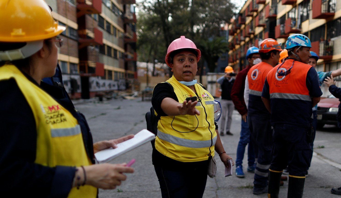 People rushed out of their buildings and onto the streets and emergency services jumped into action when the quake hit at about 5.39pm, fearing a repeat of last September’s disaster. Photo: Reuters