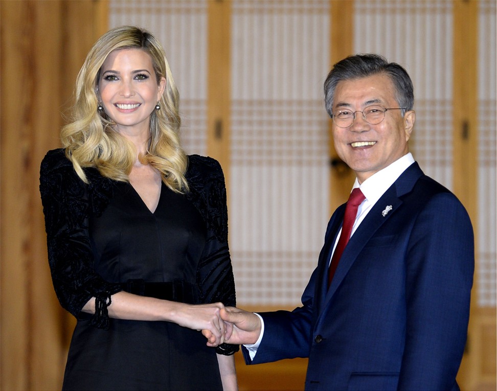 South Korean President Moon Jae-in shakes hands with Ivanka Trump, daughter of Donald Trump, during their dinner meeting at the Presidential Blue House in Seoul on Friday. She arrived in Seoul to attend the Pyeongchang Winter Olympics closing ceremony, where a top North Korean general will also be present. Photo: AFP