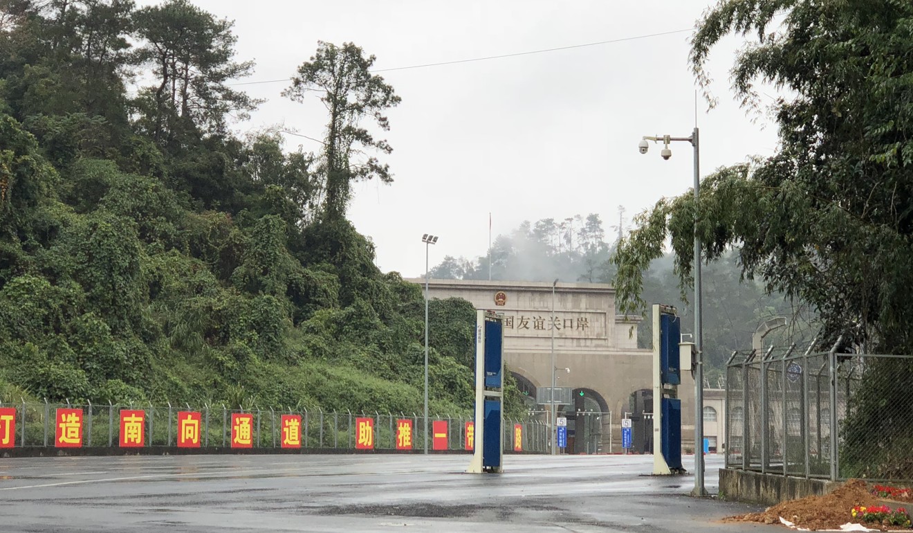 A sign reads: ‘Build Southern Transport Corridor for the Belt and Road Initiative’ at the Youyi Guan (Friendship Pass) border gate in Pingxiang, Guangxi. Photo: Handout
