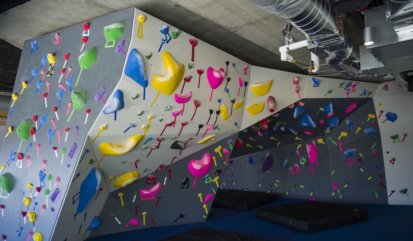 A rock climbing wall stands at the new Google campus. Photo: Bloomberg