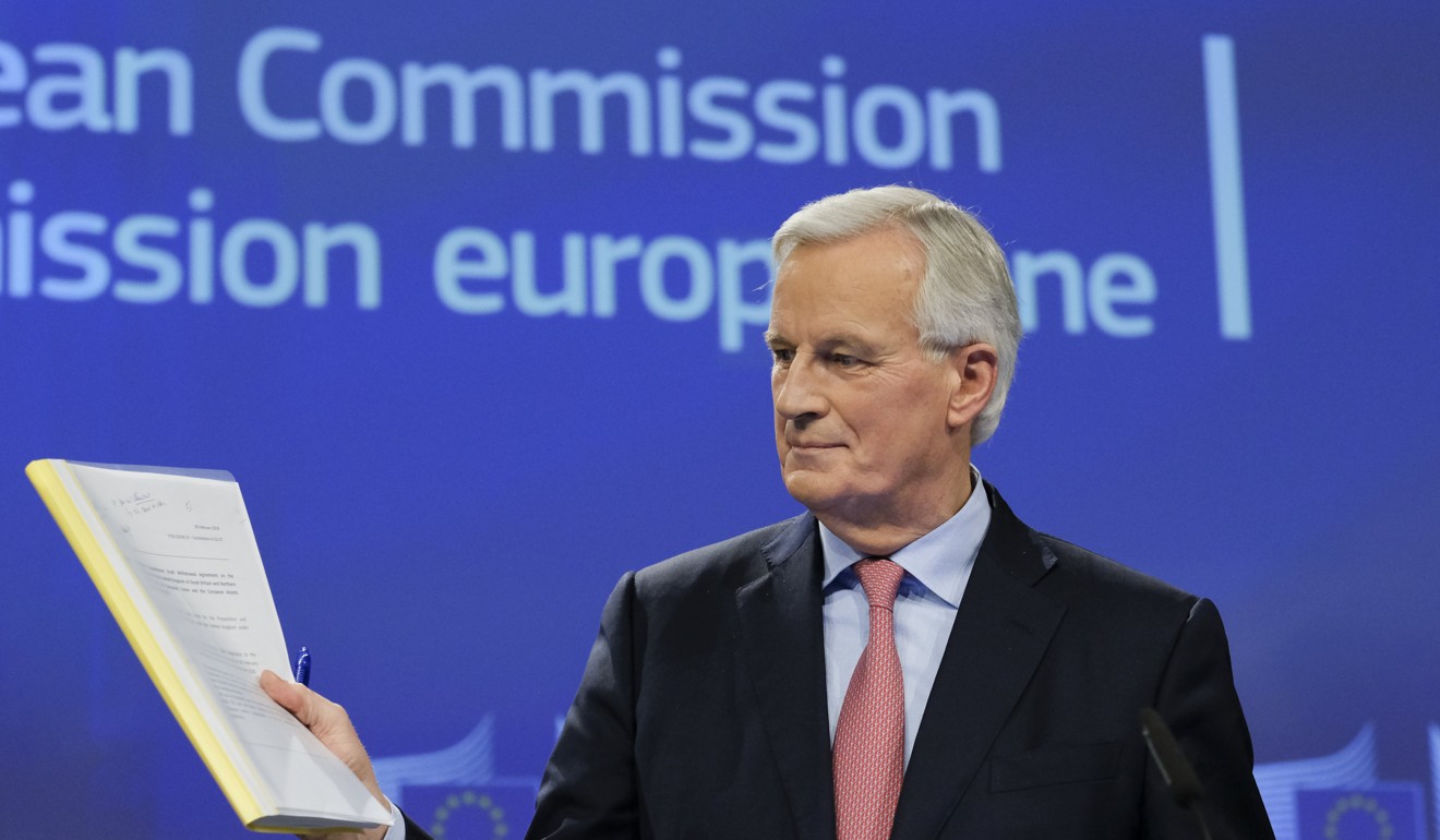 European Union chief Brexit negotiator Michel Barnier presents a draft Brexit divorce treaty at the EU headquarters in Brussels on February 28. Photo: EPA