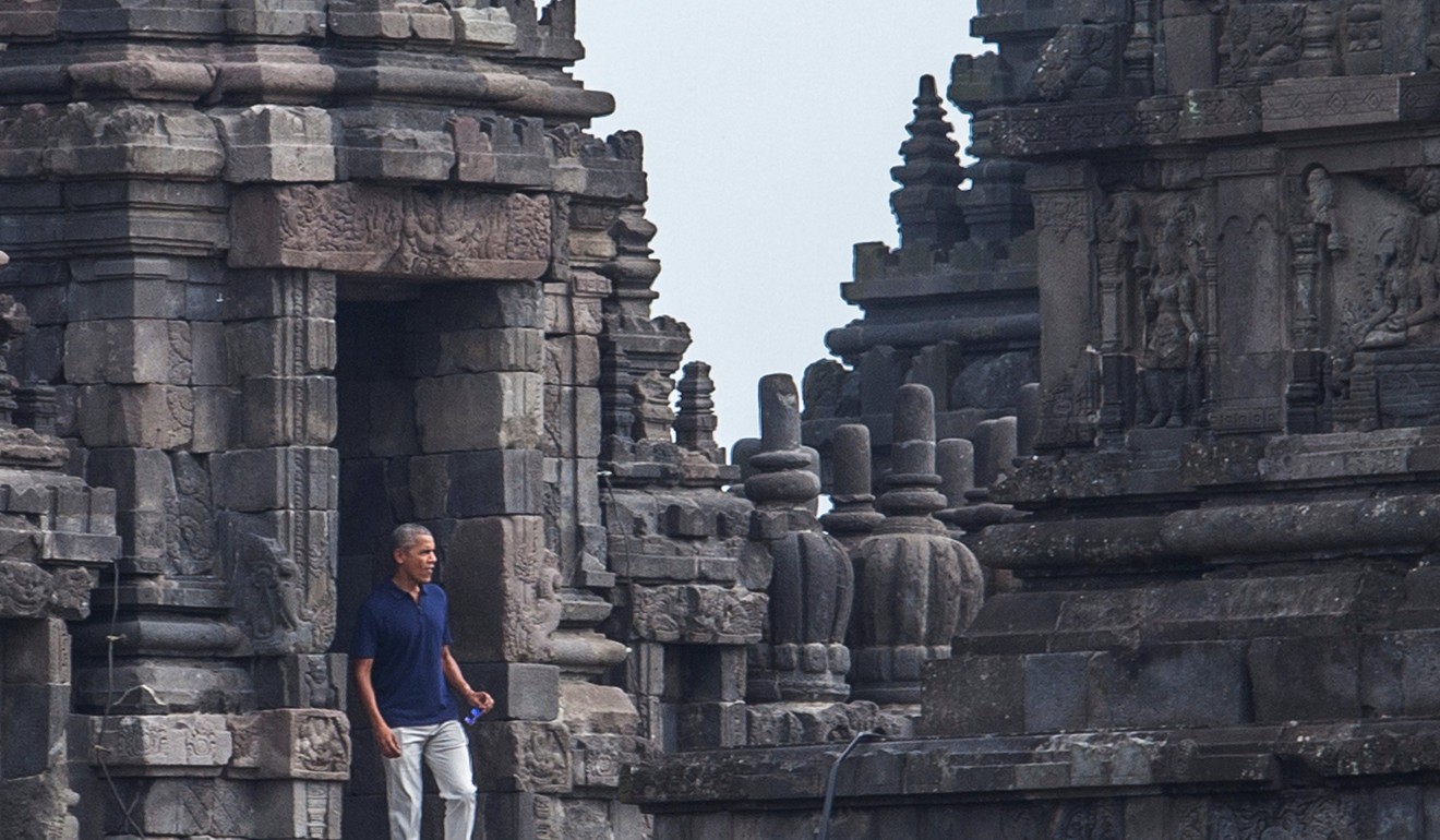 US former president Barack Obama visits the Prambanan Temple in Yogyakarta, Indonesia. Sebastian lost his original bicycle shop in a government drive to beautify the area. Photo: AP