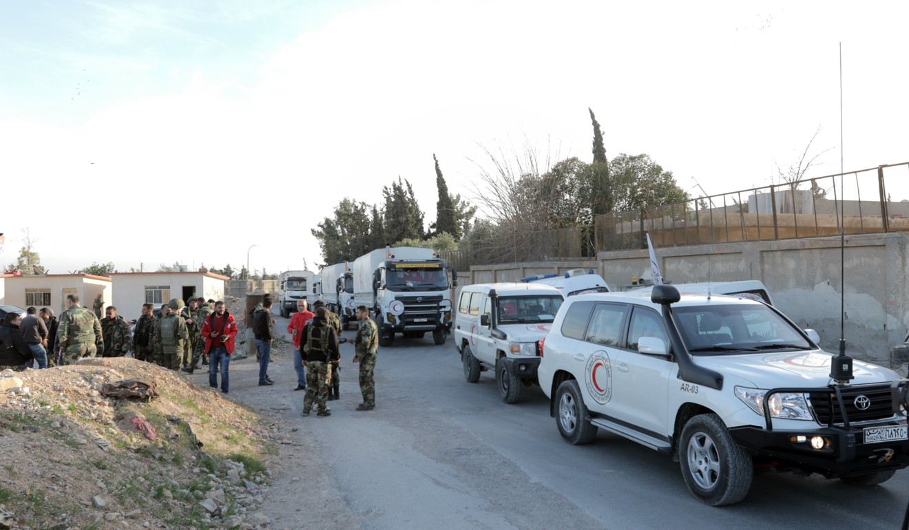 United Nations vehicles drive out of eastern Ghouta nearby Damascus, Syria. Photo: EPA