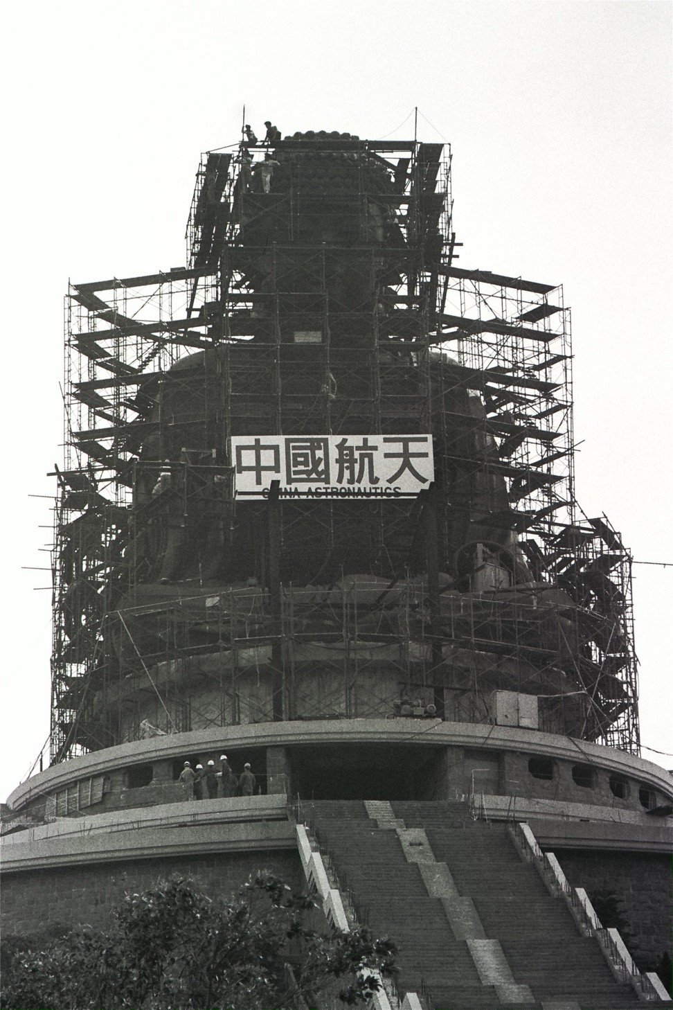 Scaffolding protects the Big Buddha as it nears completion. Photo: SCMP