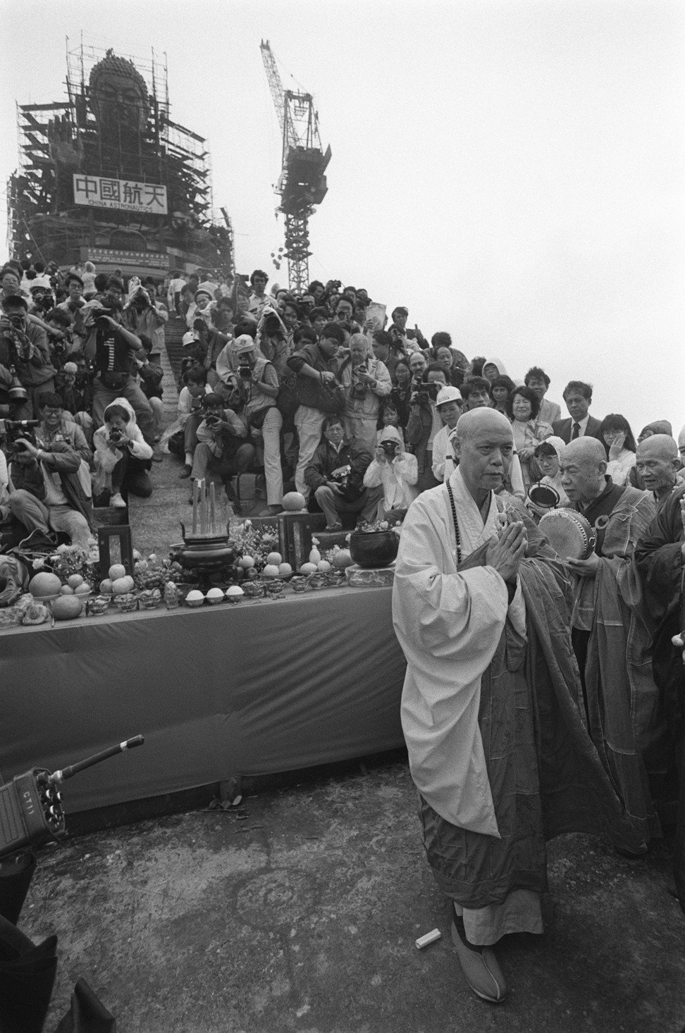 Monks hold a purification ceremony for the nearly completed Tian Tan Buddha statue. Photo: Sam Chan