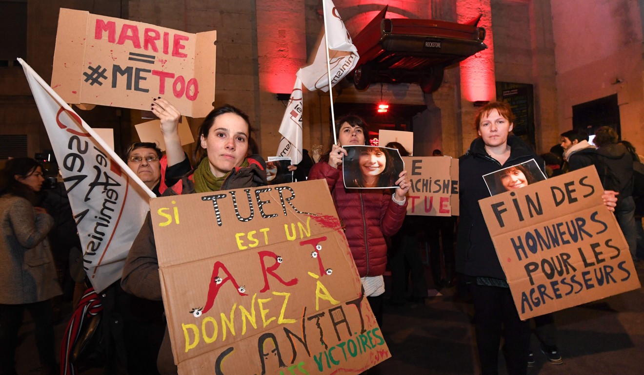 Women from feminist organisations protest outside a concert by French singer Bertrand Cantat as it takes place in Montpellier, southern France on Monday. Photo: Agence France-Presse