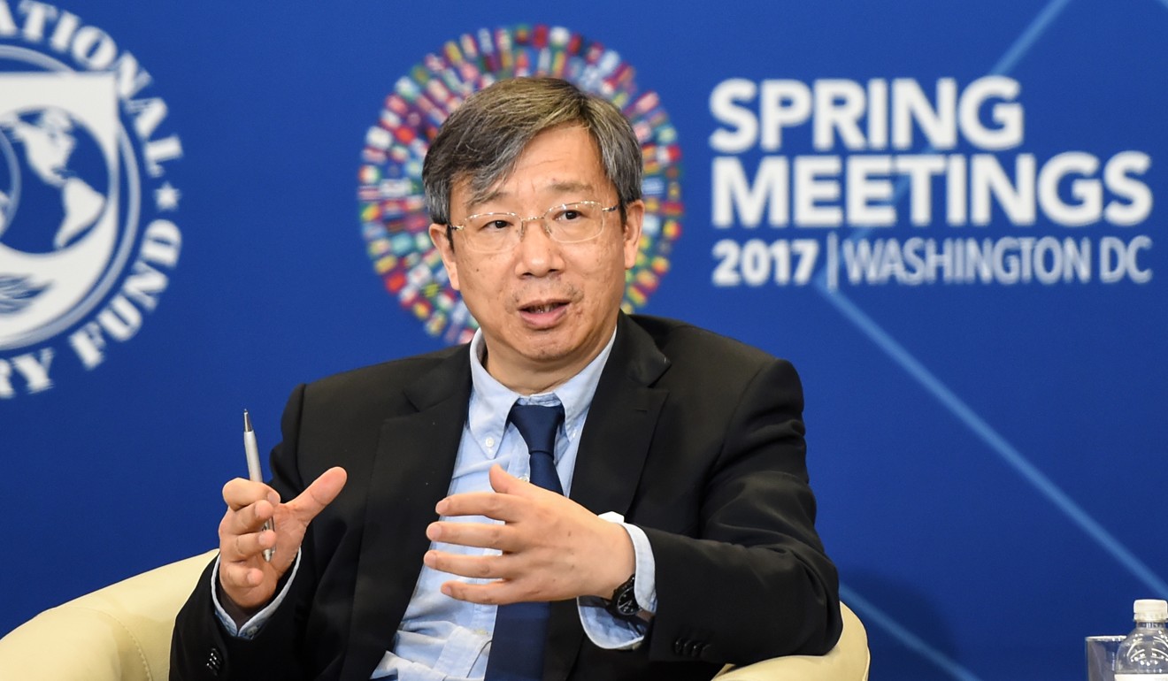 It’s widely felt that the promotion of PBOC deputy governor Yi Gang to the bank’s top role would allow for a smooth transition. Photo: Xinhua