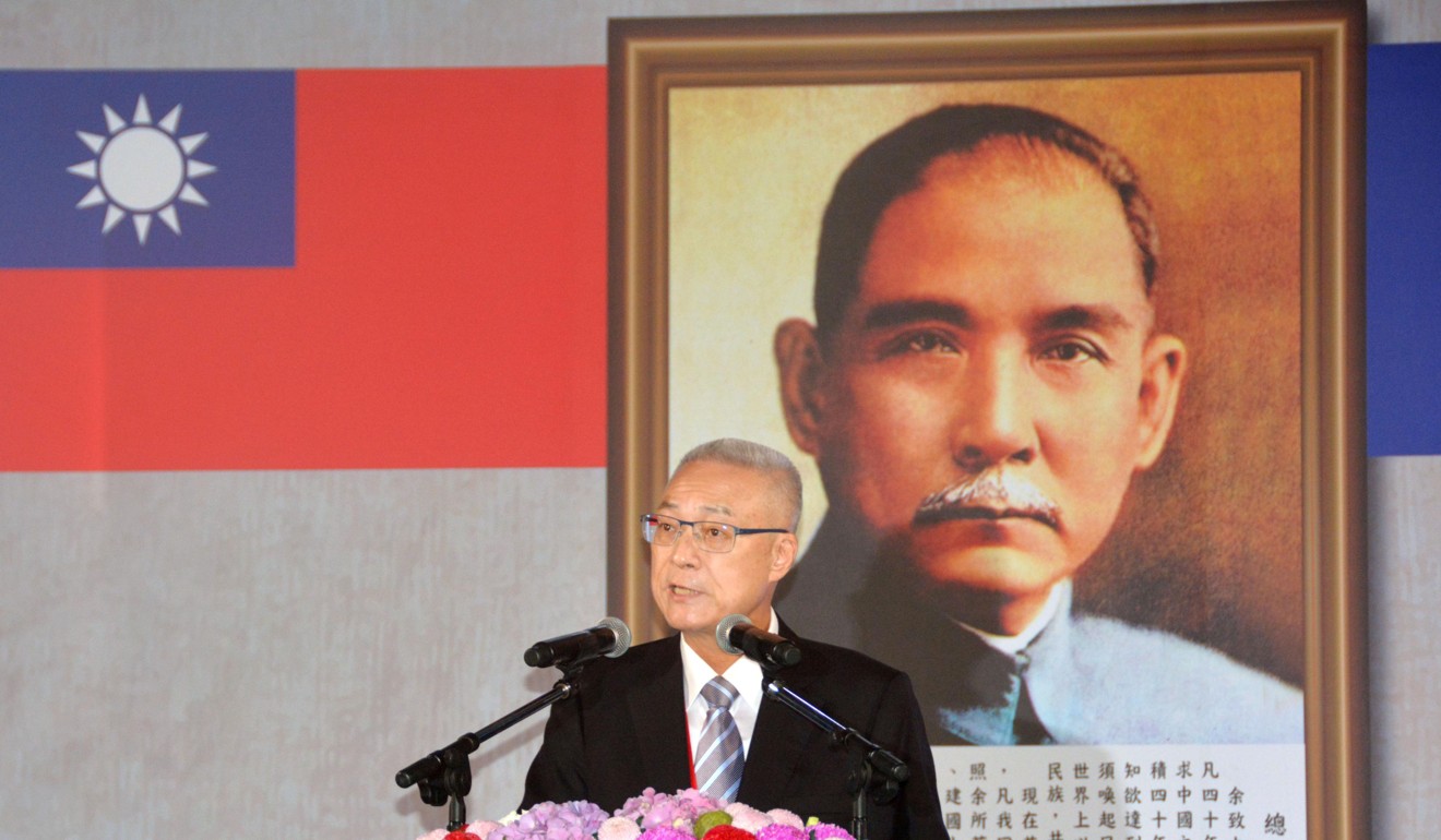 Wu Den-yih, leader of Taiwan's main opposition Kuomintang party, speaks in front of a portrait of party founder Sun Yat-sen. Wu will go to Beijing later this month, stoking interest in how he will react to the recent Taiwan policies. Photo: Kyodo