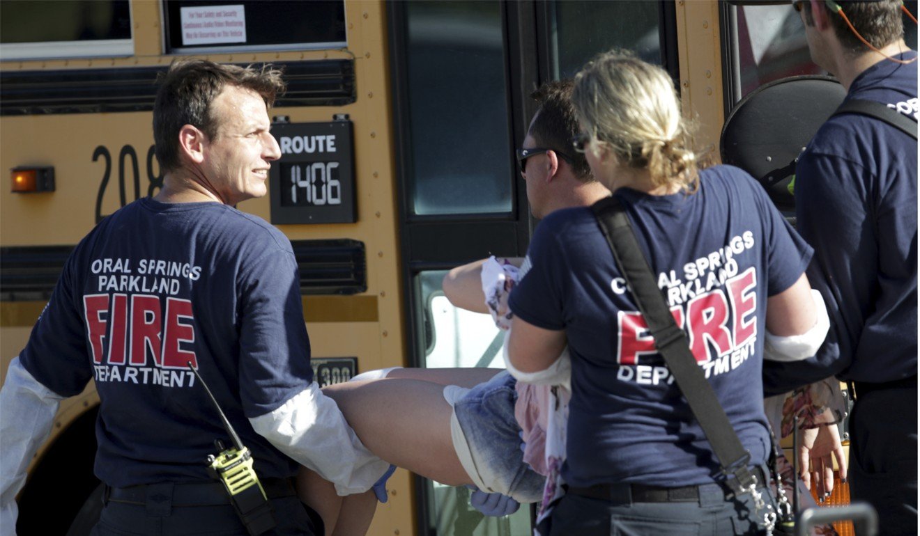 Medical personnel tend to a victim following the shooting. File photo: South Florida Sun-Sentinel via AP