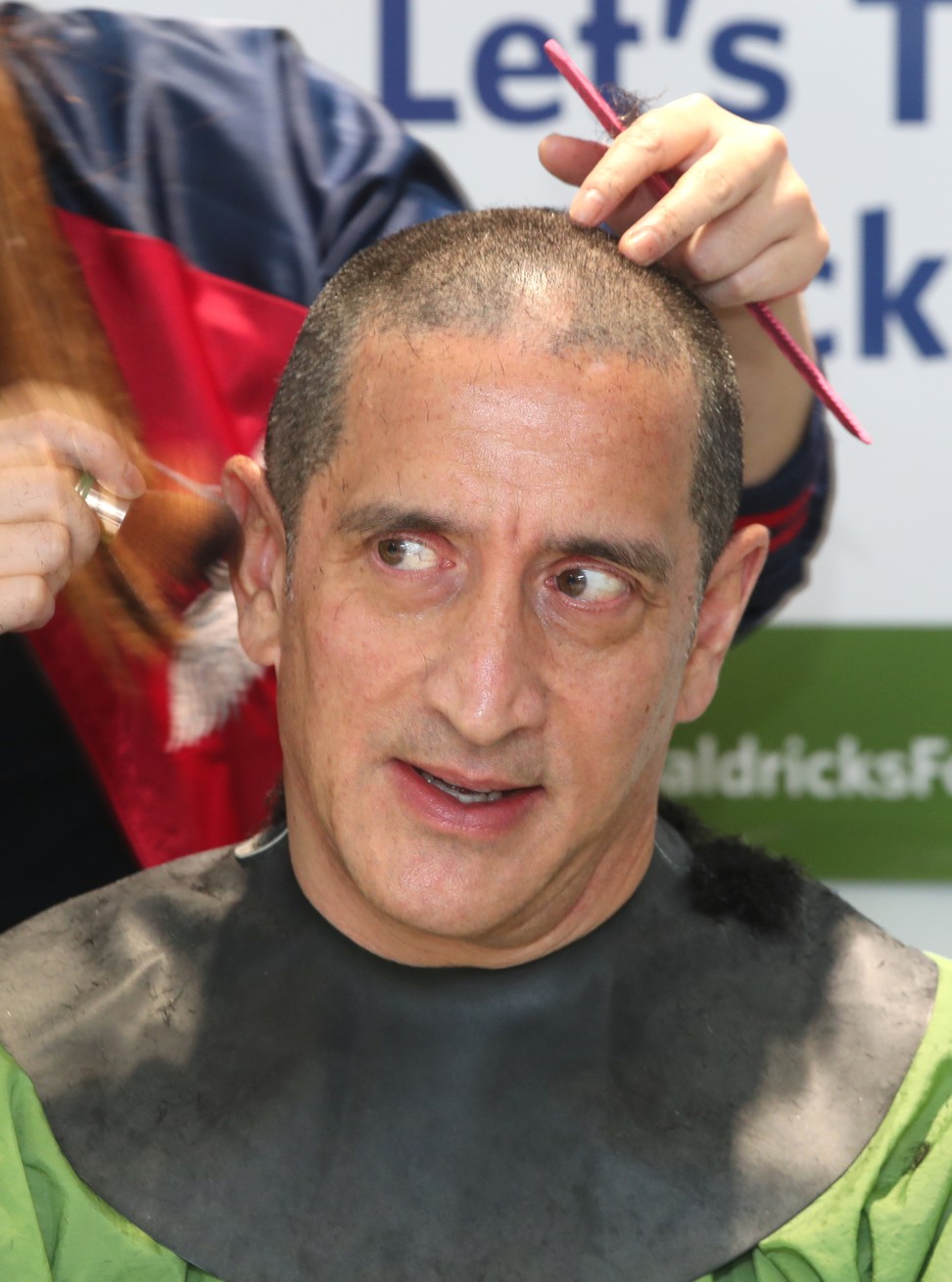 It is the eighth time in 10 years that Shane Akeroyd has had his head shaved for St Baldrick’s. Photo: K. Y. Cheng