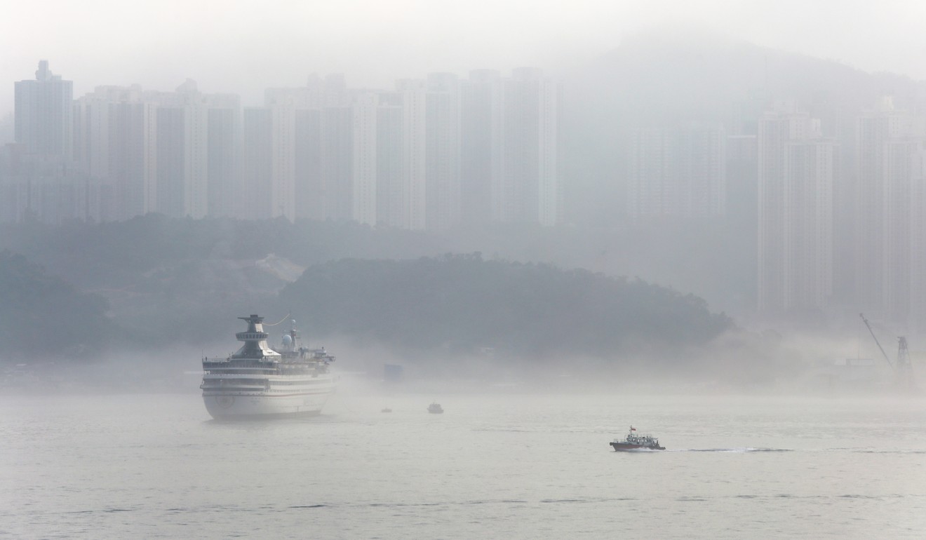 A blanket of fog covers Victoria Harbour at about 8am on Friday. Photo: Xiaomei Chen 