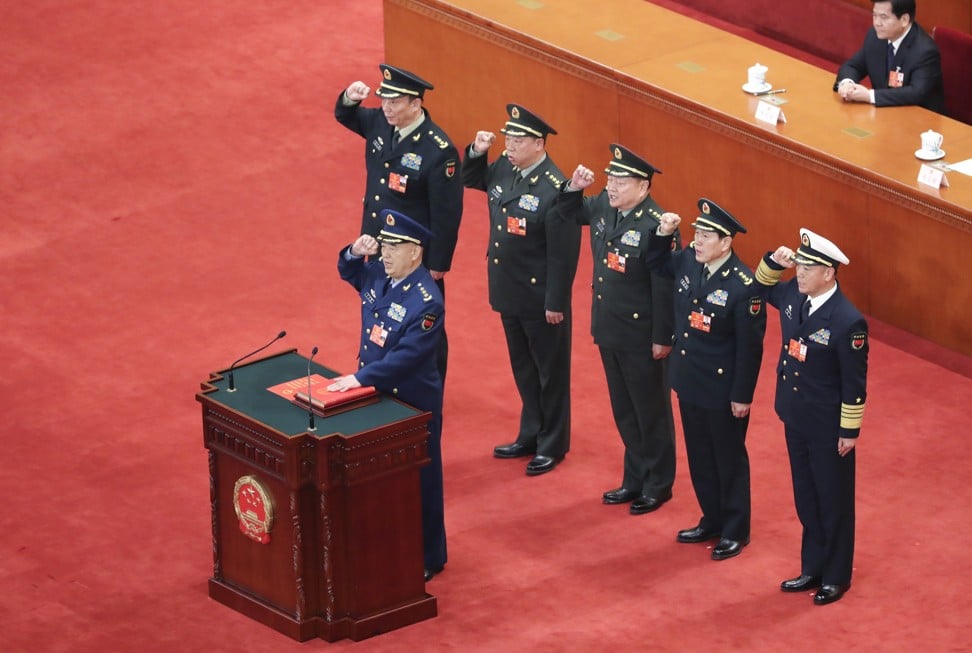 The ceremony on Sunday was the first time China’s military chiefs had been required to swear their allegiance to the constitution. Photo: Xinhua