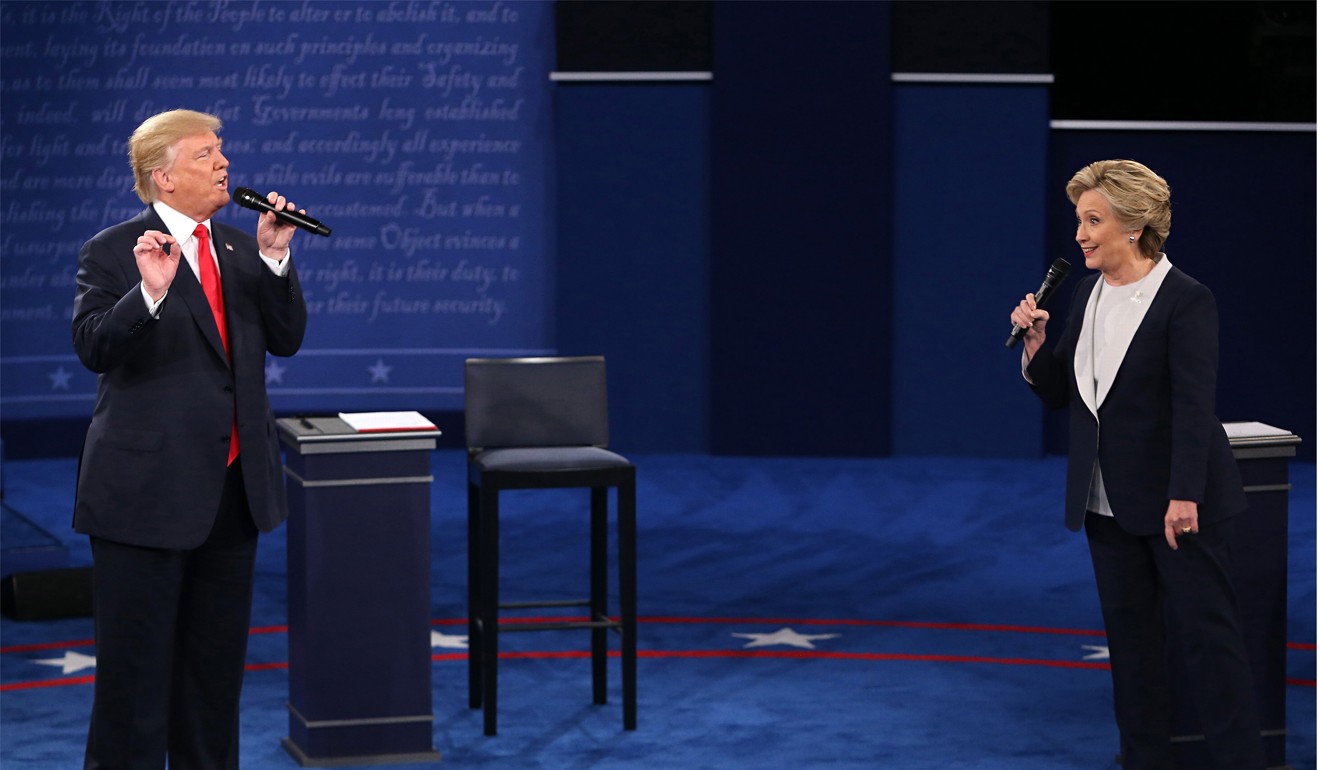 Donald Trump and Hillary Clinton on stage during the second debate between the Republican and Democratic presidential candidates on October 9, 2016. Photo: St. Louis Post-Dispatch via TNS