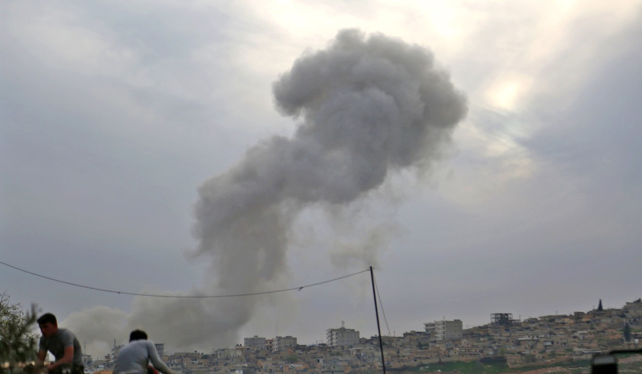 Smoke billows following the explosion in the northwestern Syrian city of Afrin after Syrian-Arab Turkish backed fighters took control of the city from the Kurdish People's Protection Units (YPG) on March 18, 2018. Photo: Agence France-Presse