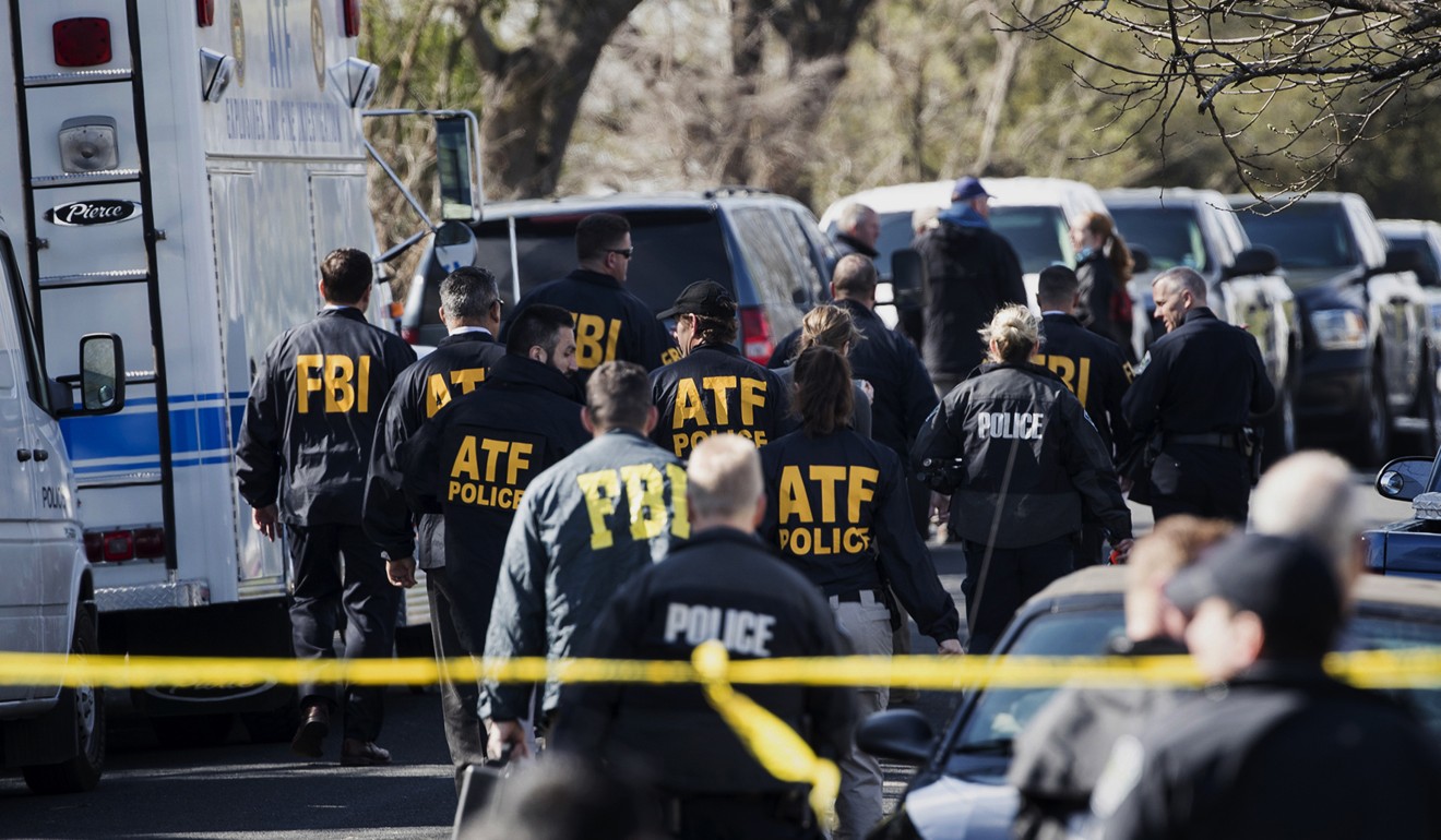 Authorities work on the scene of an explosion in Austin on Monday, March 12. Photo: AP