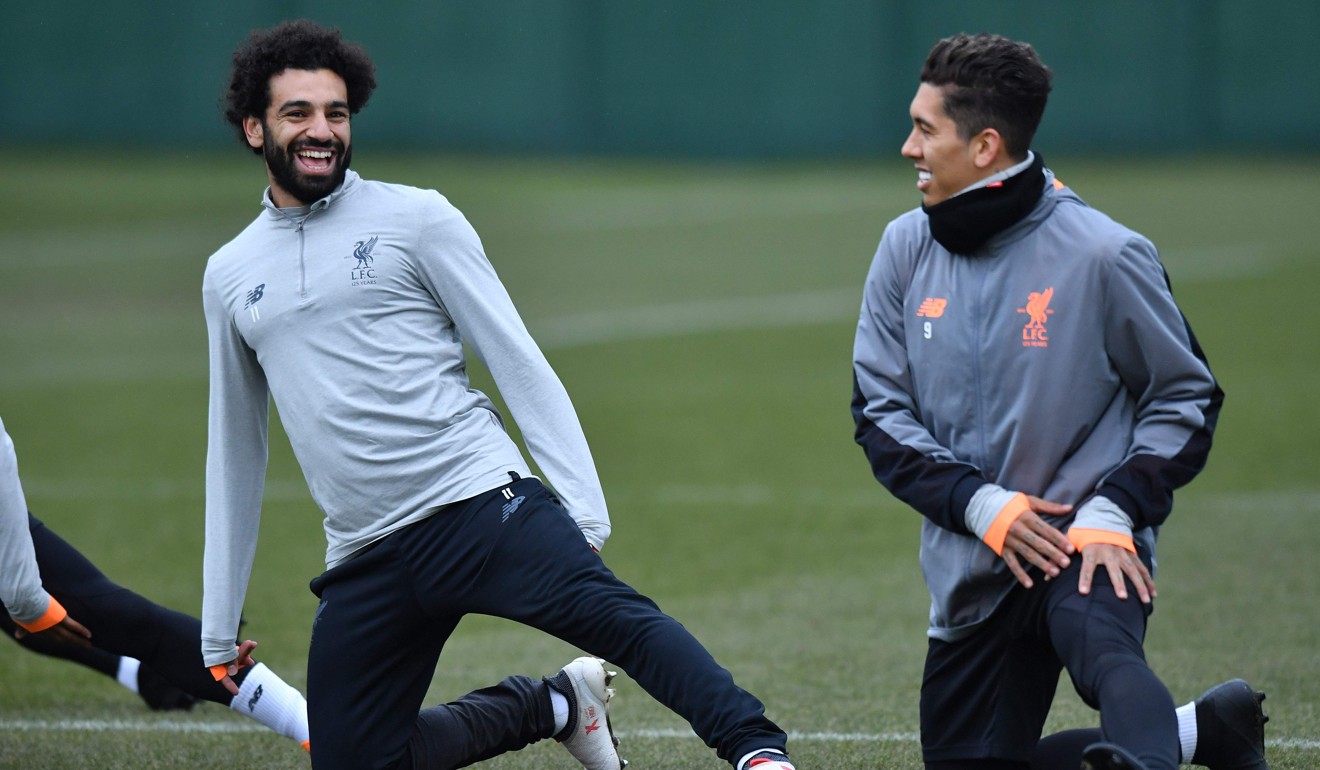 Roberto Firmino says he feels no added pressure given the incredible form of his Liverpool teammate Mohamed Salah. Photo: AFP