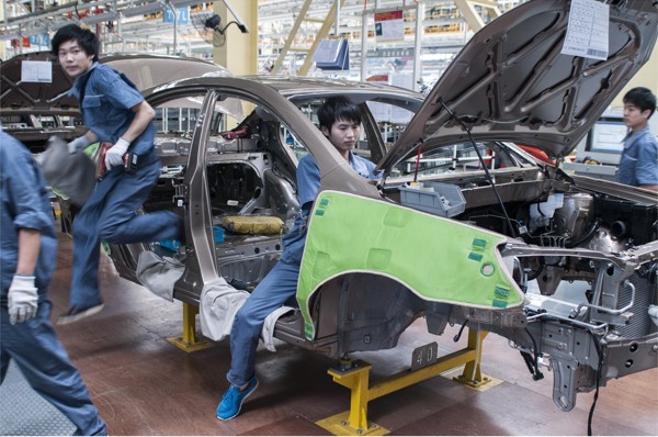 Workers at the new Geely assembly lines in Cixi in Zhejiang province, which is now almost fully automated. Photo: Zigor Aldama