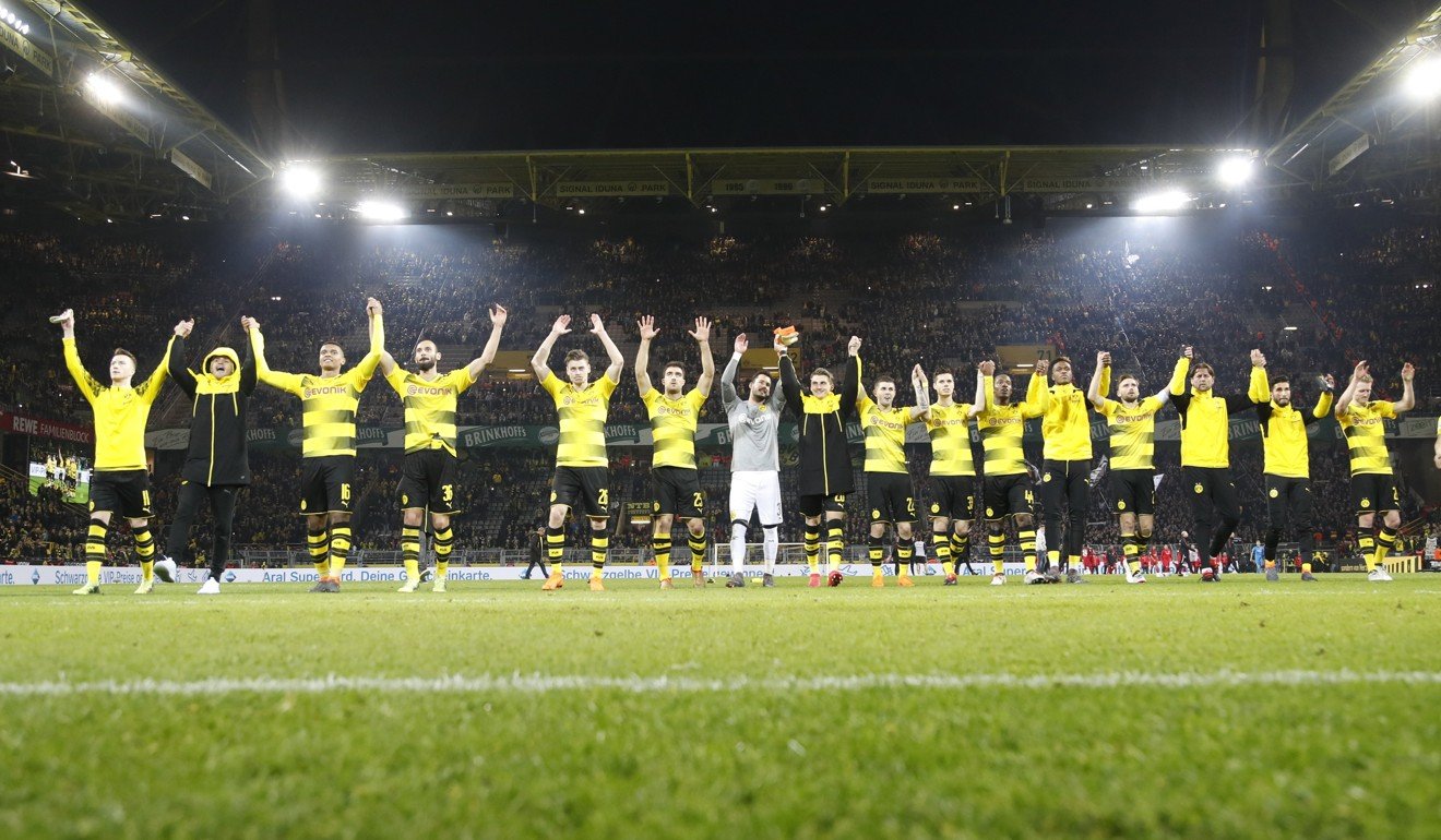 Dortmund players celebrate after the Bundesliga match against Eintracht Frankfurt. Photo: EPA