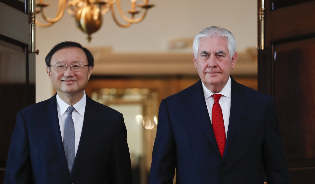 State Councillor Yang Jiechi meets former secretary of state Rex Tillerson in Washington in February. Photo: AP