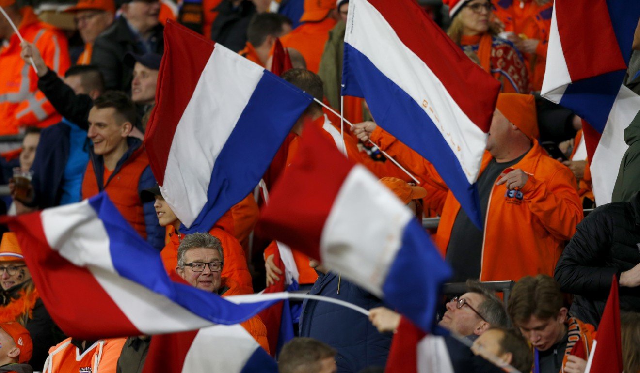 Netherlands fans enjoy the England game in a peaceful manner. Photo: AP