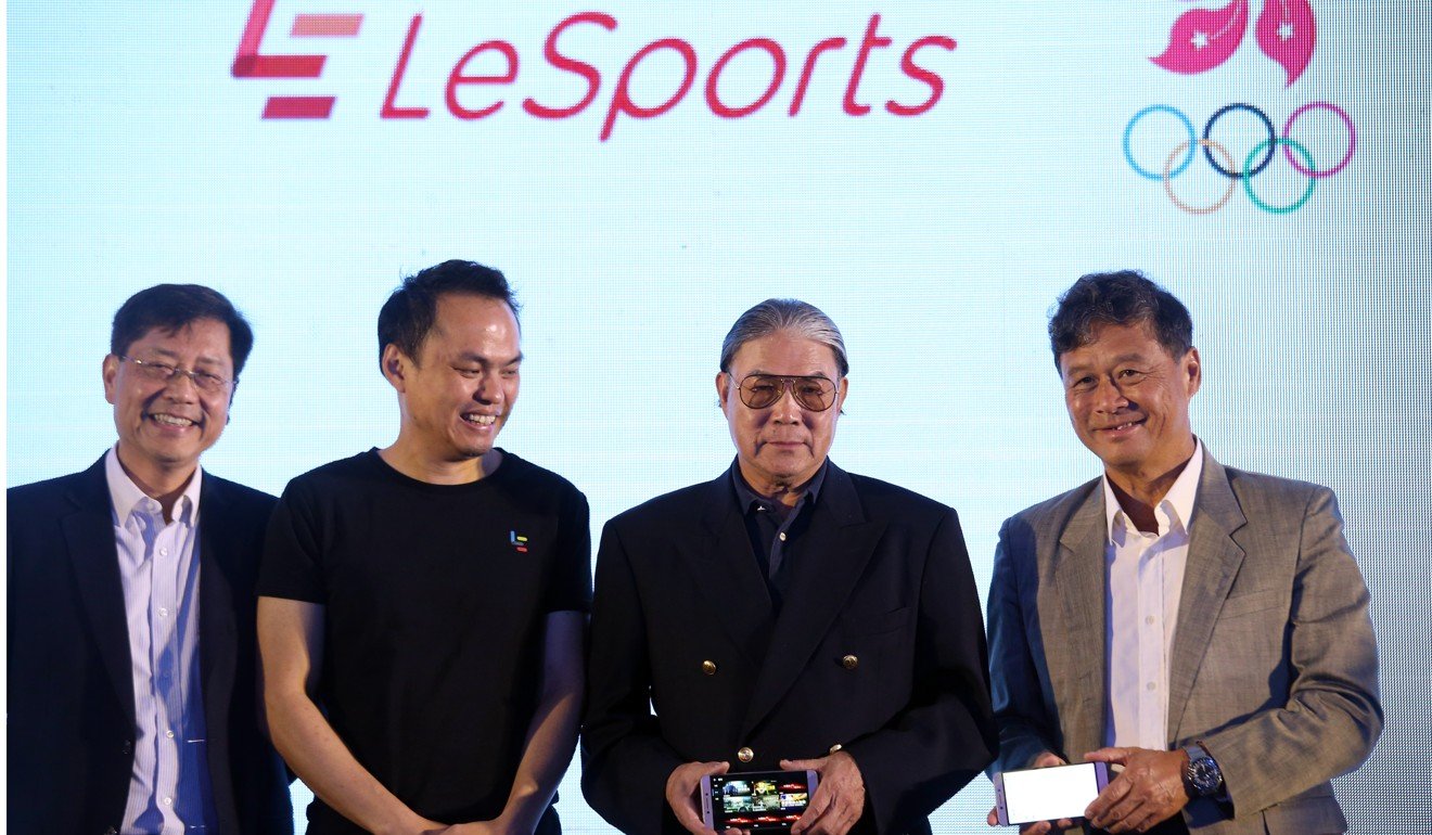 Lai Yu-ching (left), chief executive of LeSports HK, with Mok Chui-tin (second left), group vice-president and Asia-Pacific CEO of LeEco. Photo: David Wong