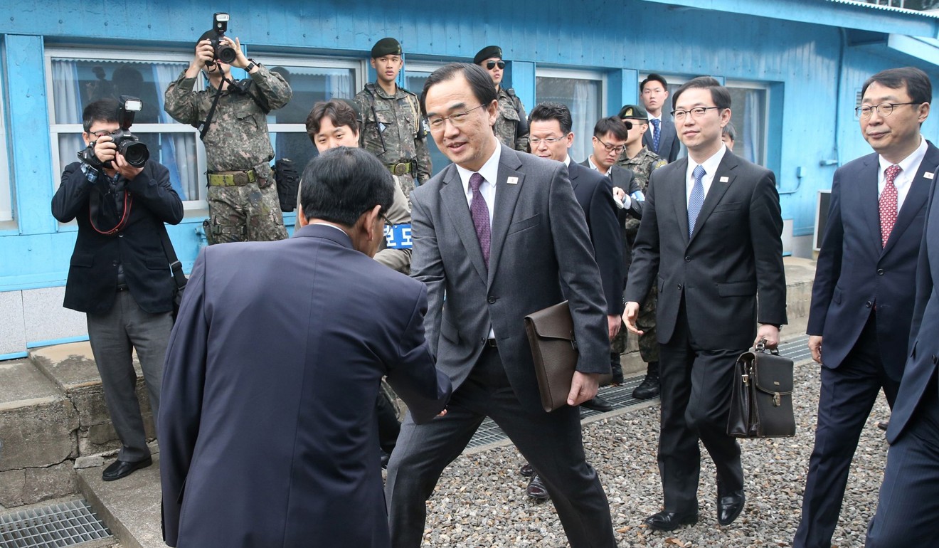 South Korean Unification Minister Cho Myoung-gyun crosses the border line to attend a high-level inter-Korea talks on the northern side of the border truce of village of Panmunjom. Photo: AFP