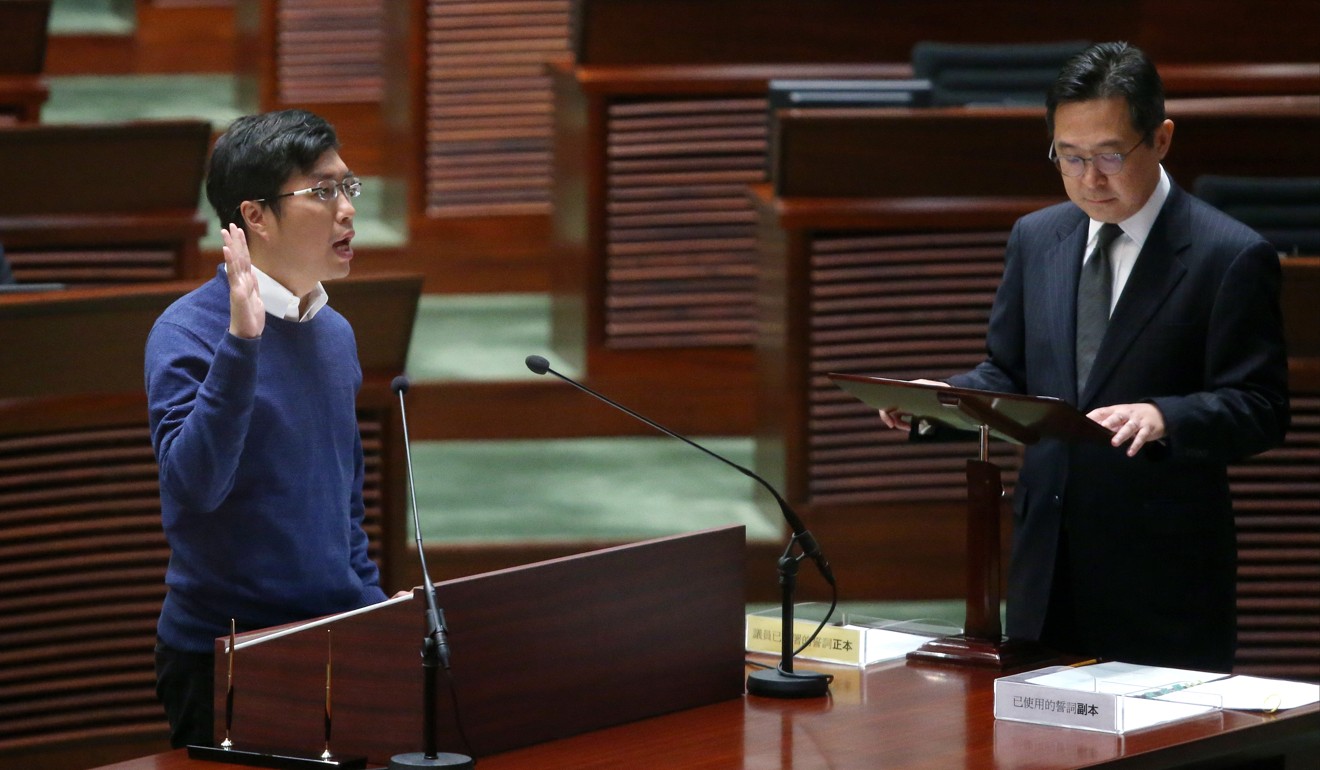 Au Nok-hin is sworn in at the Legislative Council. Photo: Sam Tsang