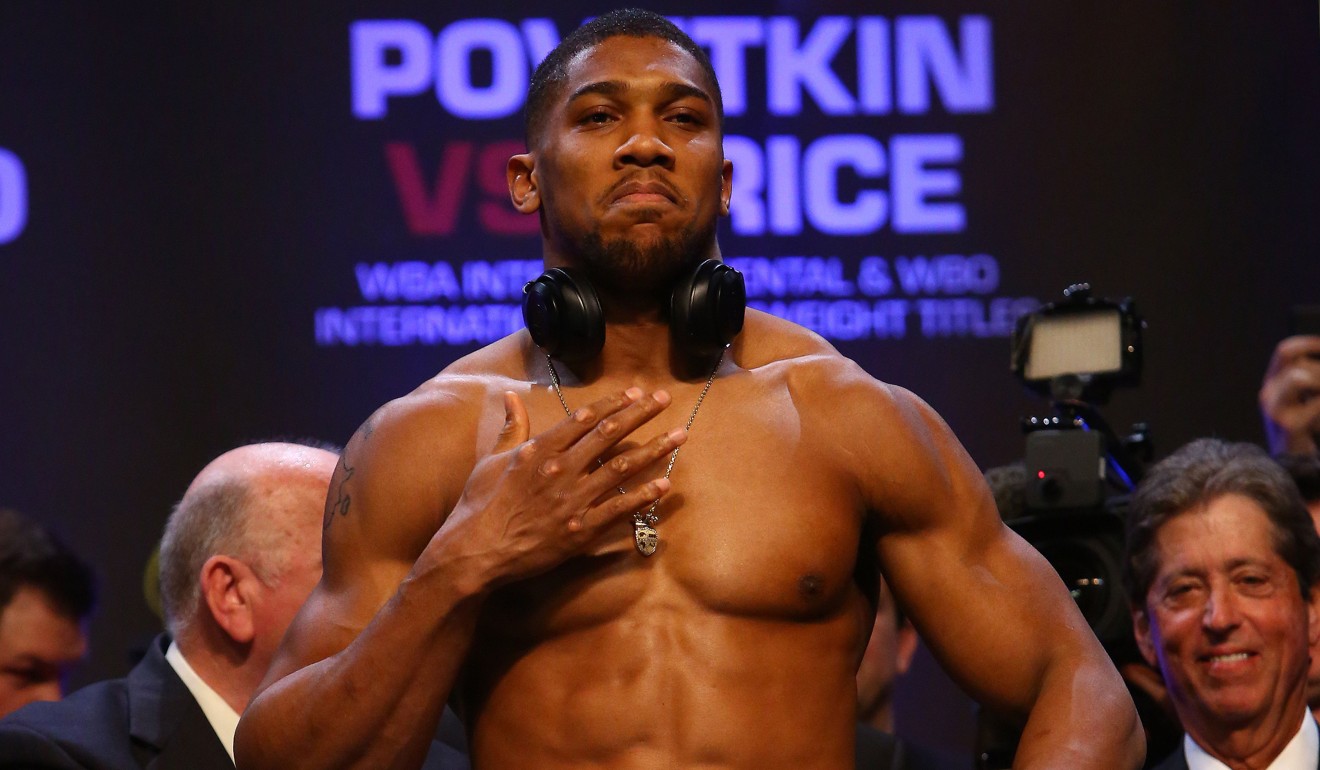 Britain's Anthony Joshua attends a weigh-in photocall. Photo: AFP