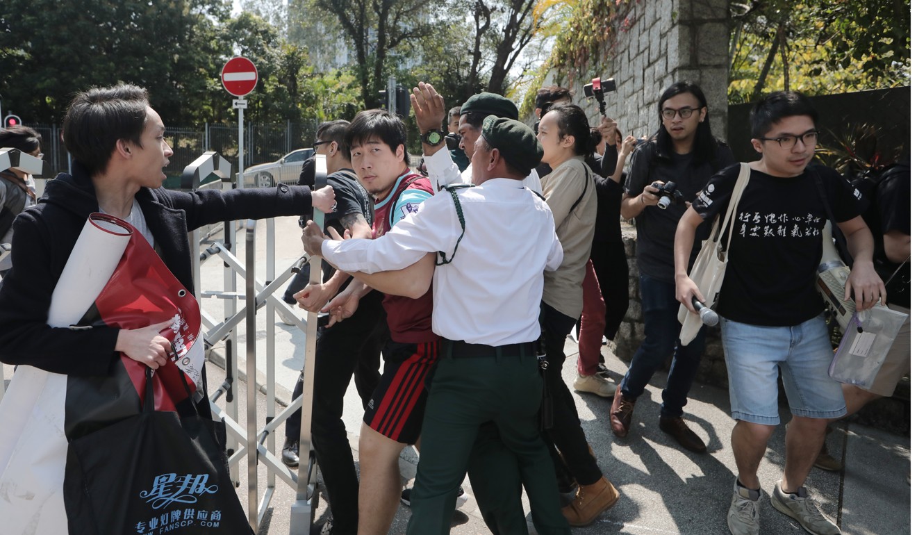 There were minor scuffles between protesters and security guards. Photo: Handout