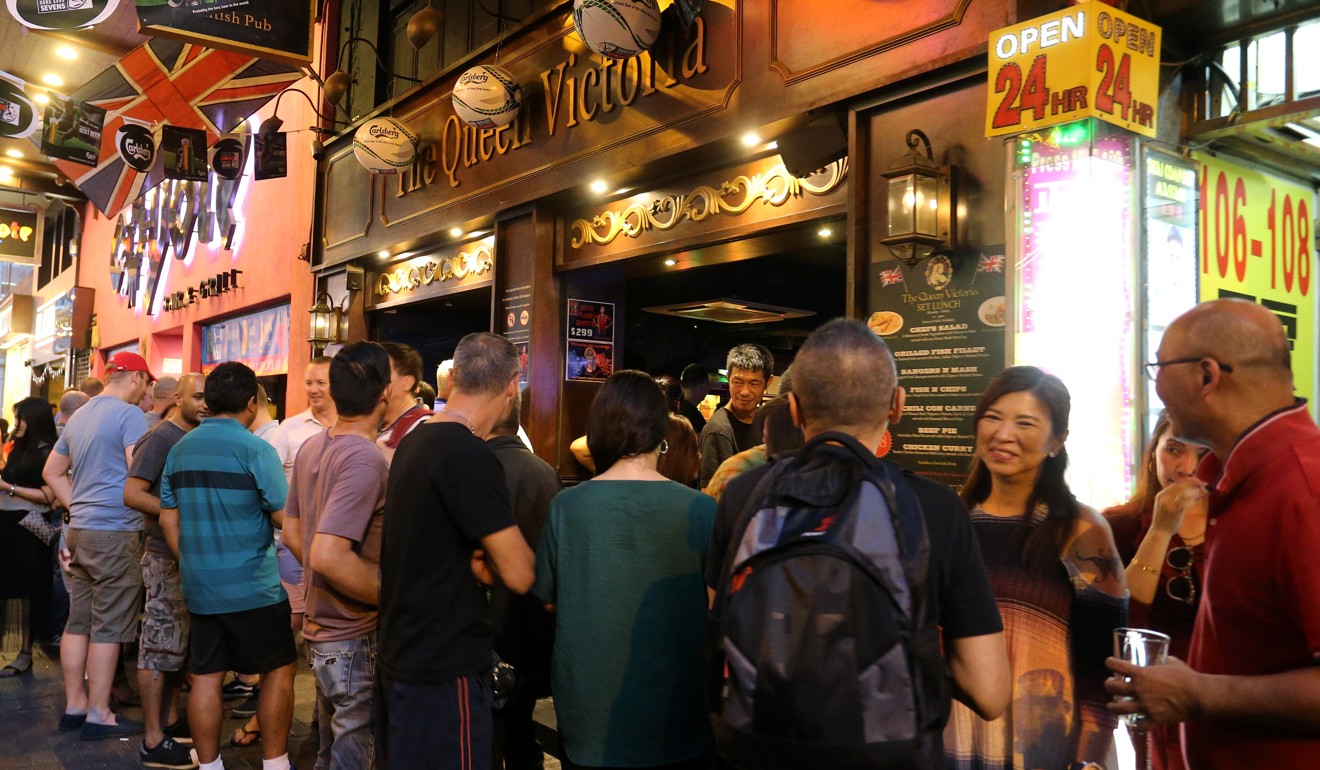 Revellers outside The Queen Victoria in Wan Chai during Hong Kong Rugby Sevens week. Photo: Dickson Lee