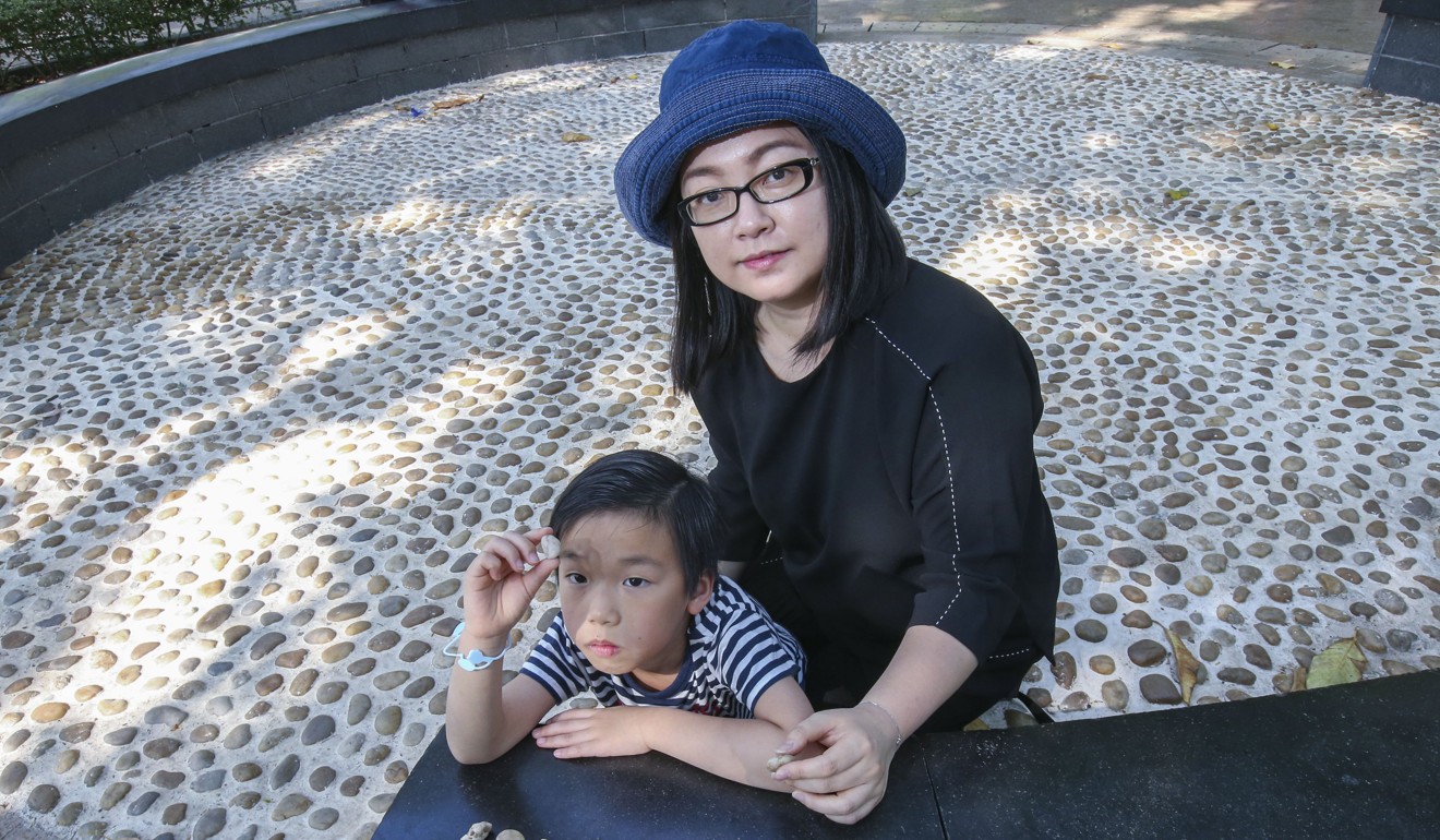 Shirley Tang Shuet-yiu (right) and her son Sirius Yip Shing-yuk at the playground in Victoria Park that prompted the boy to write to Hong Kong officials. Photo: David Wong